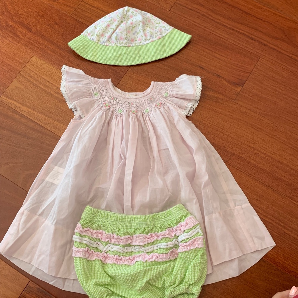 Pink dress with matching hat and bloomers.